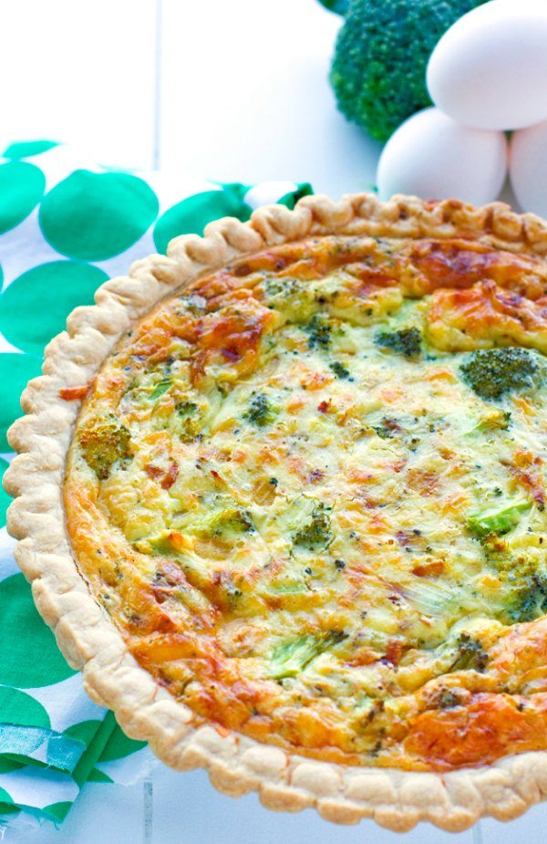 This easy vegetarian broccoli quiche recipe has a creamy smooth custard interior, and it’s filled with broccoli and sharp white cheddar cheese.