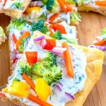 Crescent Roll Pizza with fresh vegetables.