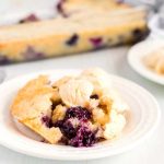 Serve the blueberry cobbler with vanilla ice cream.