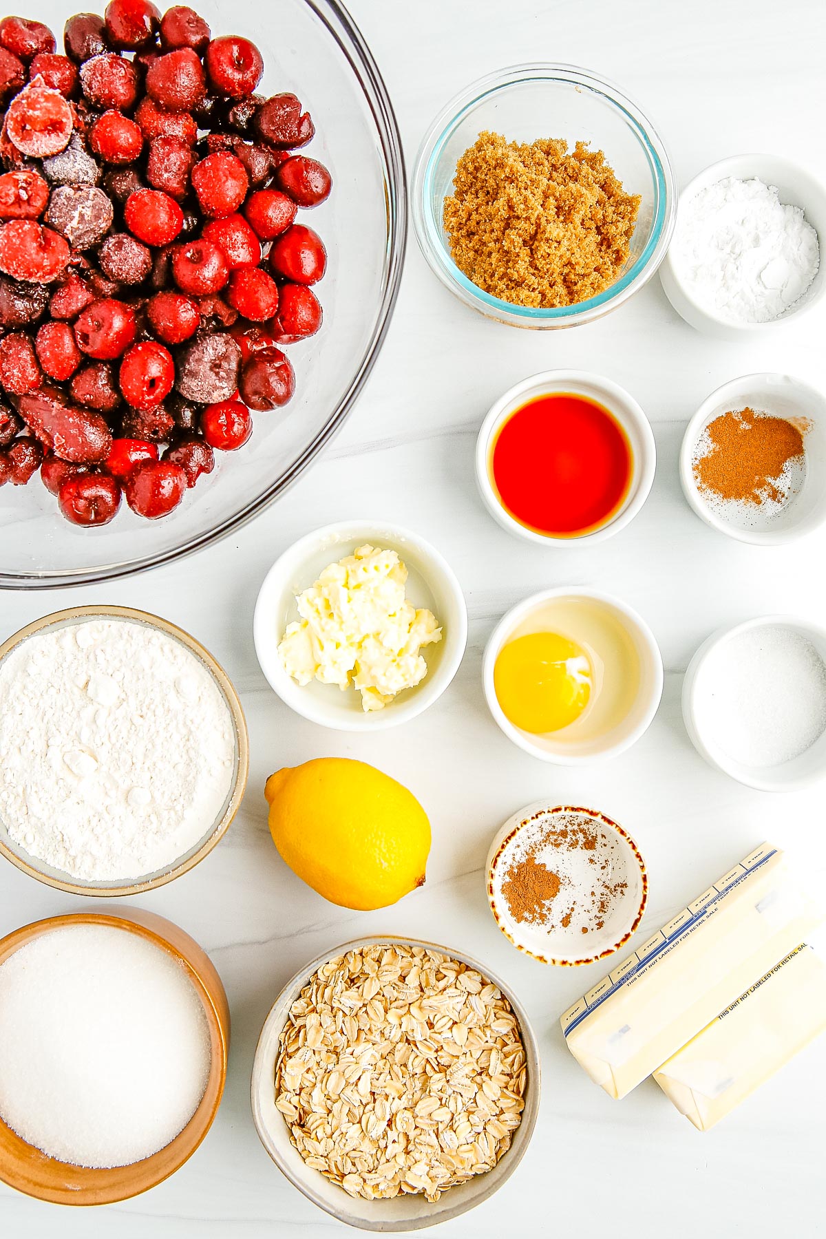 An overhead picture of all of the ingredients needed to make this Cherry Crumble Pie recipe.