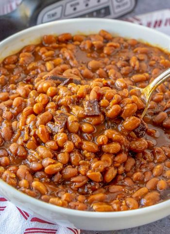 A spoon full of Boston Baked Beans.