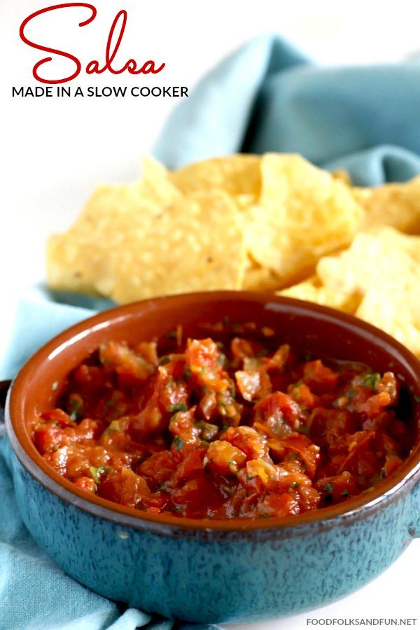Slow Cooker Salsa in a bowl with a bowl of chips