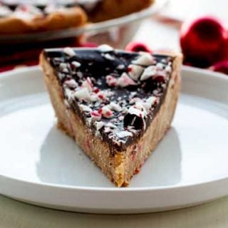 One slice of Peppermint Bark Sugar Cookie Pie on a plate