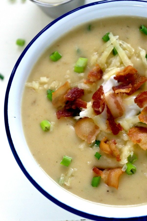 A close-up of Slow Cooker Potato Soup with bacon crumbles in a bowl