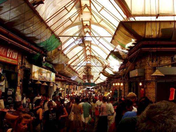 The Shuk in Jerusalem busy with people. 
