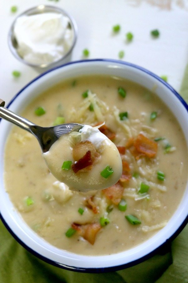 A spoonful of Slow Cooker Potato Soup in a bowl