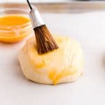 Brush the dough with egg.