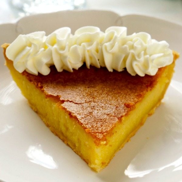 Tangy, velvety custard, and a crackly, crisp sugar top make this Buttermilk Pie irresistible. It’s a Southern classic and so simple to make.
