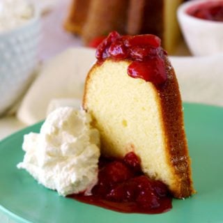 A piece of Cream Cheese Pound Cake with strawberry topping