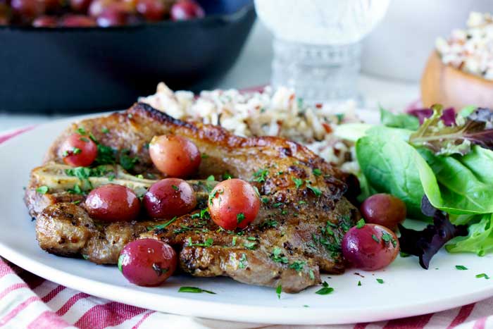 Skillet Pork Chops with Grapes is an easy dinner party recipe. 