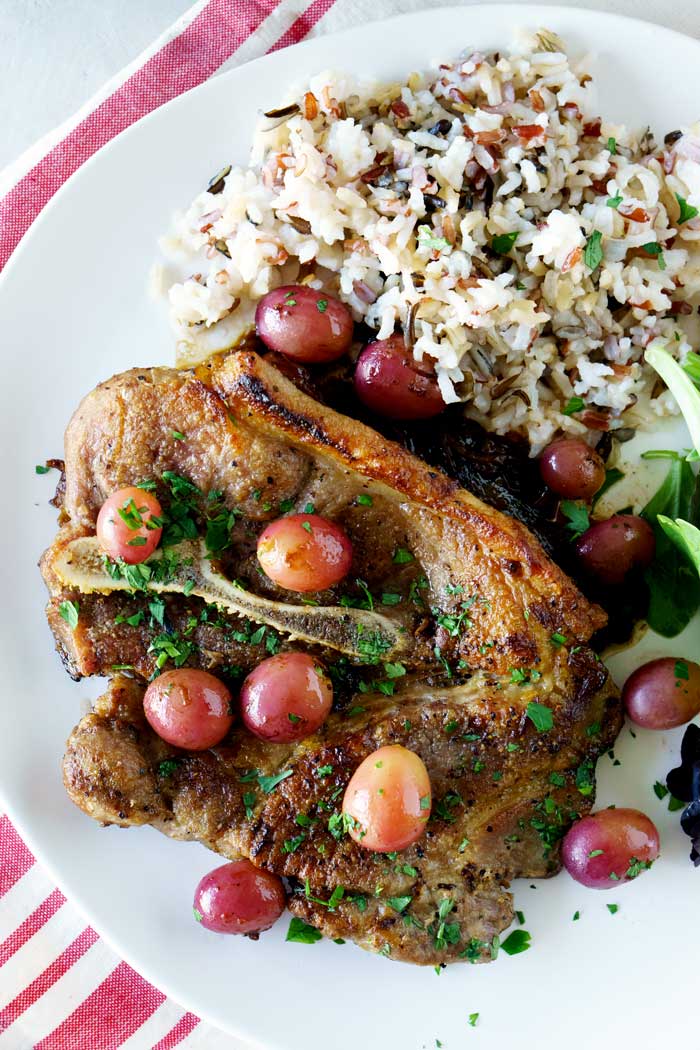 Caramelized Shallots and Red Grapes served with Skillet Pork Chops