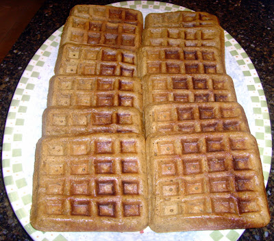 two rows of gingerbread waffles on a plate