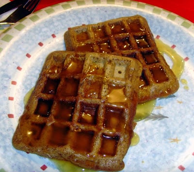 Two gingerbread waffles on a plate
