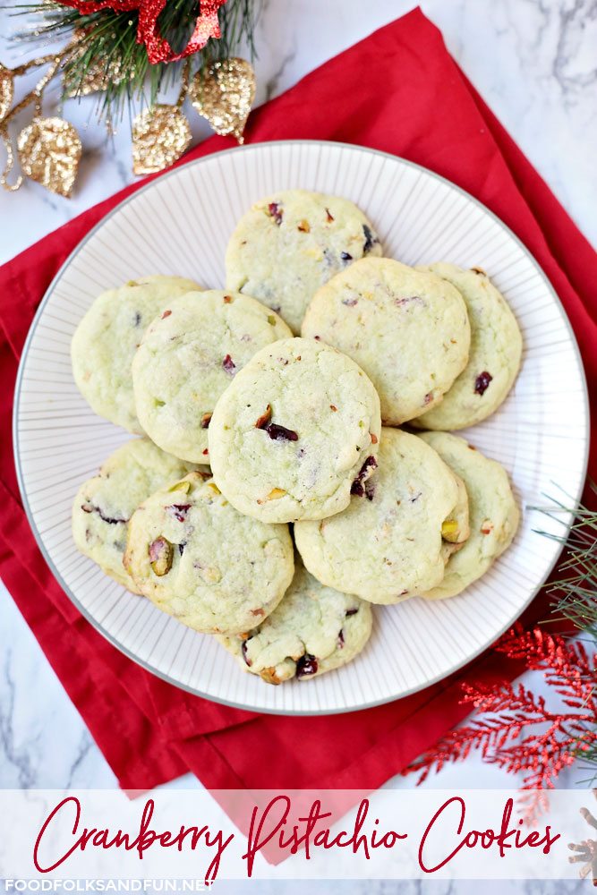Pistachio pudding cookies on a white plate with a red napkin underneath.