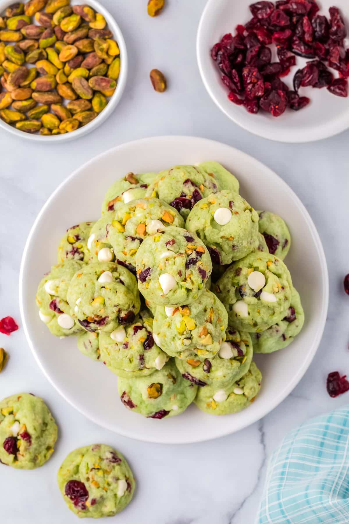 An overhead picture of a plate full of Pistachio Cookies.