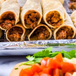A close up picture of the finished beef taquitos recipe so you can se what's inside of the,.