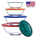 Various sizes of glass bowls with lids