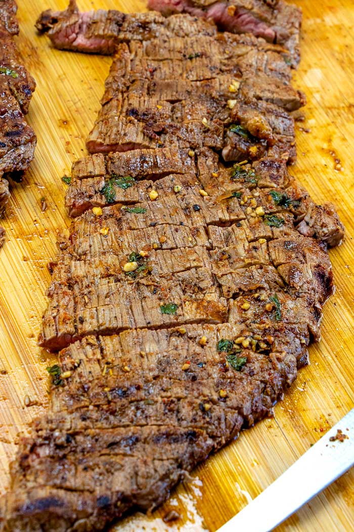 Skirt Steak that has been marinated, grilled, and sliced for carne asada street tacos.