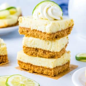 A close up picture of three Key Lime Bars stacked on top of each other.