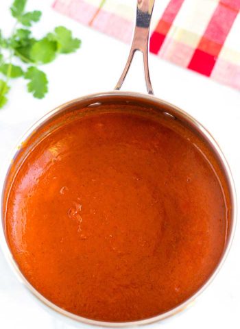 Finished enchilada sauce in a saucepan.