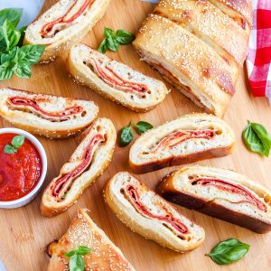 An overhead picture of sliced pepperoni stromboli.