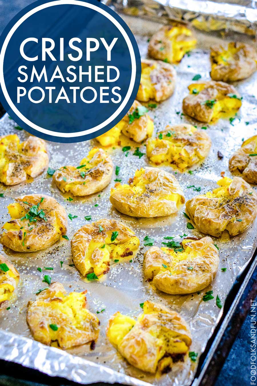 Smashed Potatoes on a baking sheet with text overlay for Pinterest