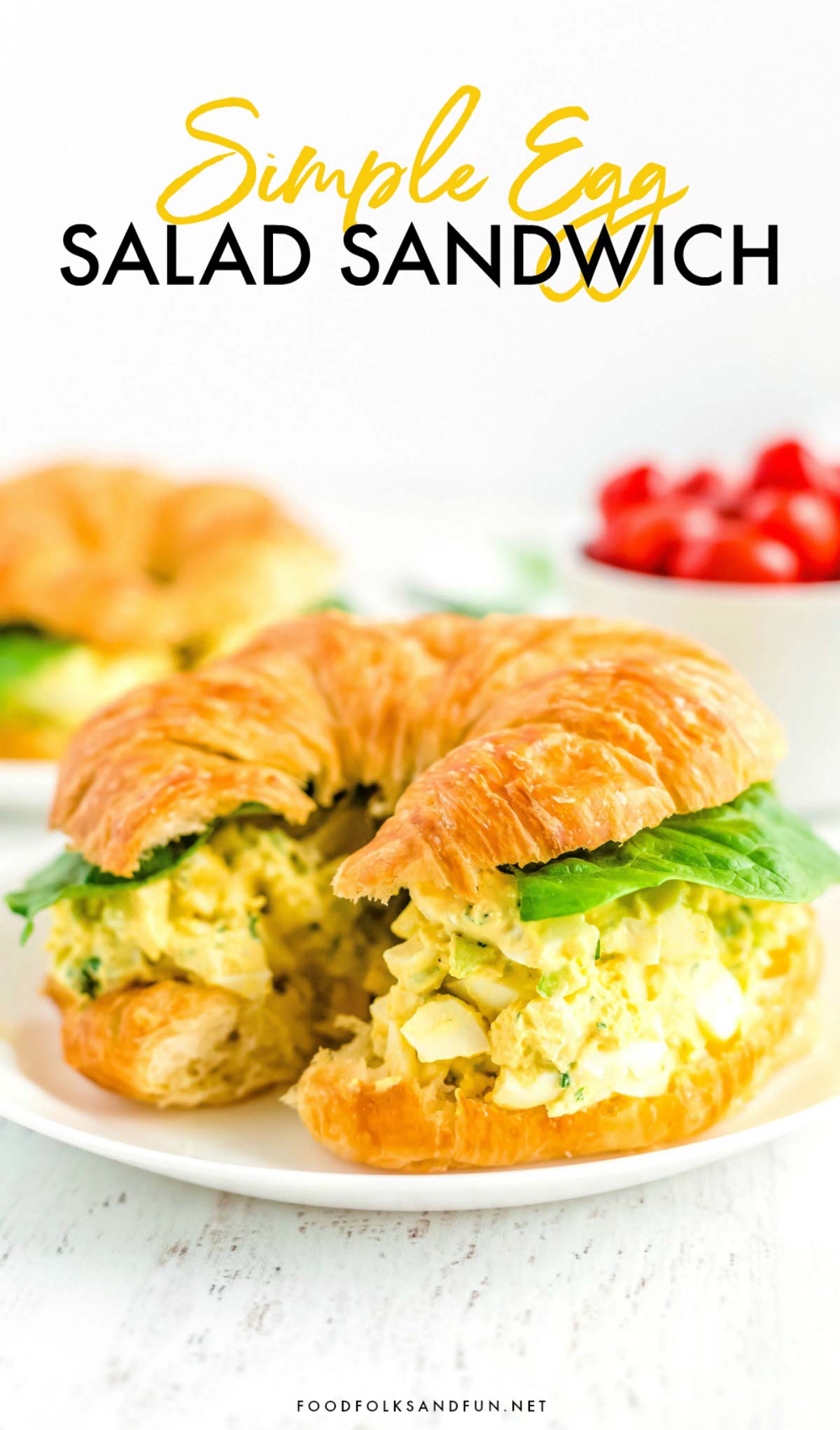 Egg Salad on a Crescent roll on a plate