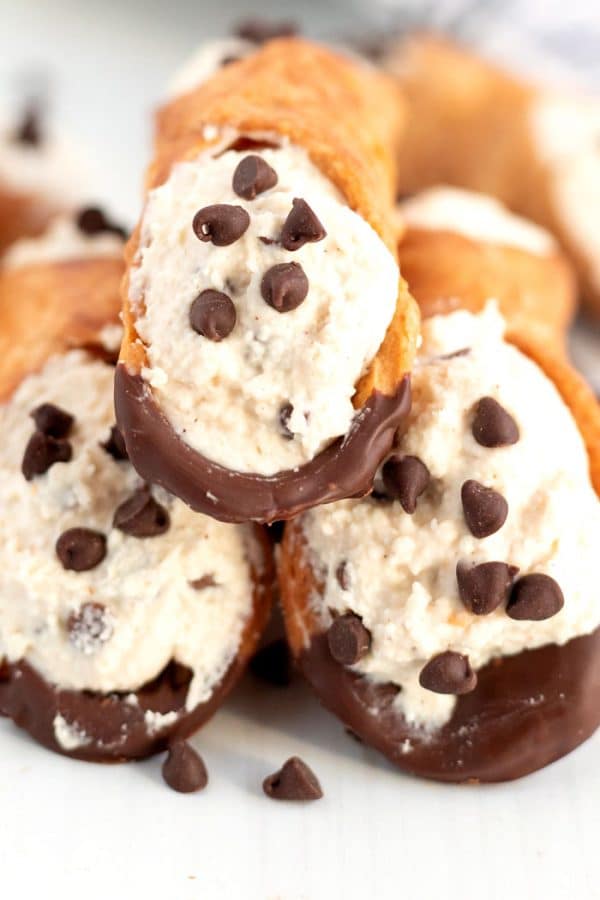 Close up picture of 3 cannolis.