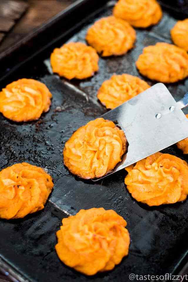 Twice-baked sweet potato puffs on a baking sheet