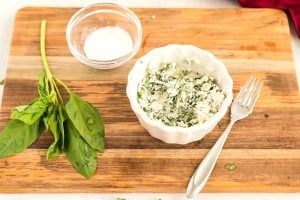 Mix together the goat cheese and basil.
