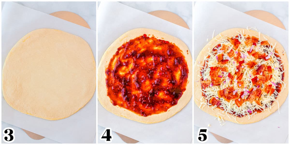 The pizza dough rolled out, with balsamit strawberry sauce spread on it and the cheese and red onion