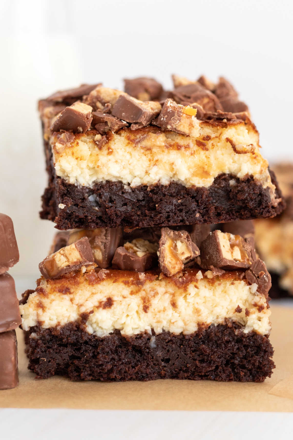 These Snickers Cheesecake Brownies have 3 layers to them: brownies, cheesecake, and Snickers! They're easy to make, and they're always a crowd-pleaser!  via @foodfolksandfun