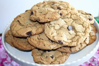 A stack of chocolate chip cookies on a plate