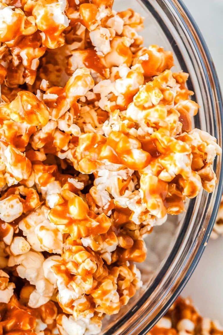 Caramel Popcorn in a glass serving bowl.
