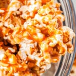 Caramel Popcorn in a glass serving bowl.