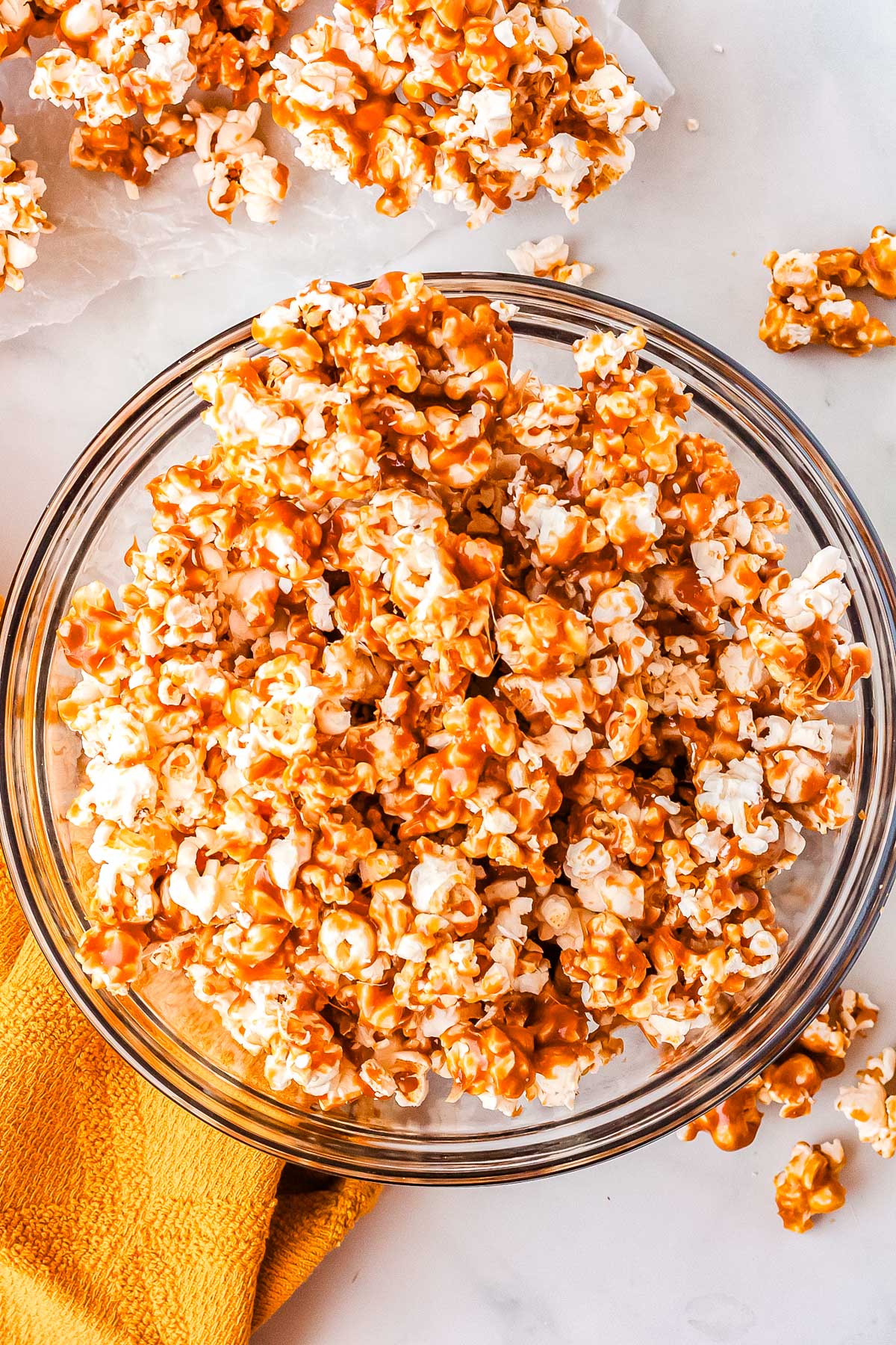 Caramel popcorn in a glass bowl. 