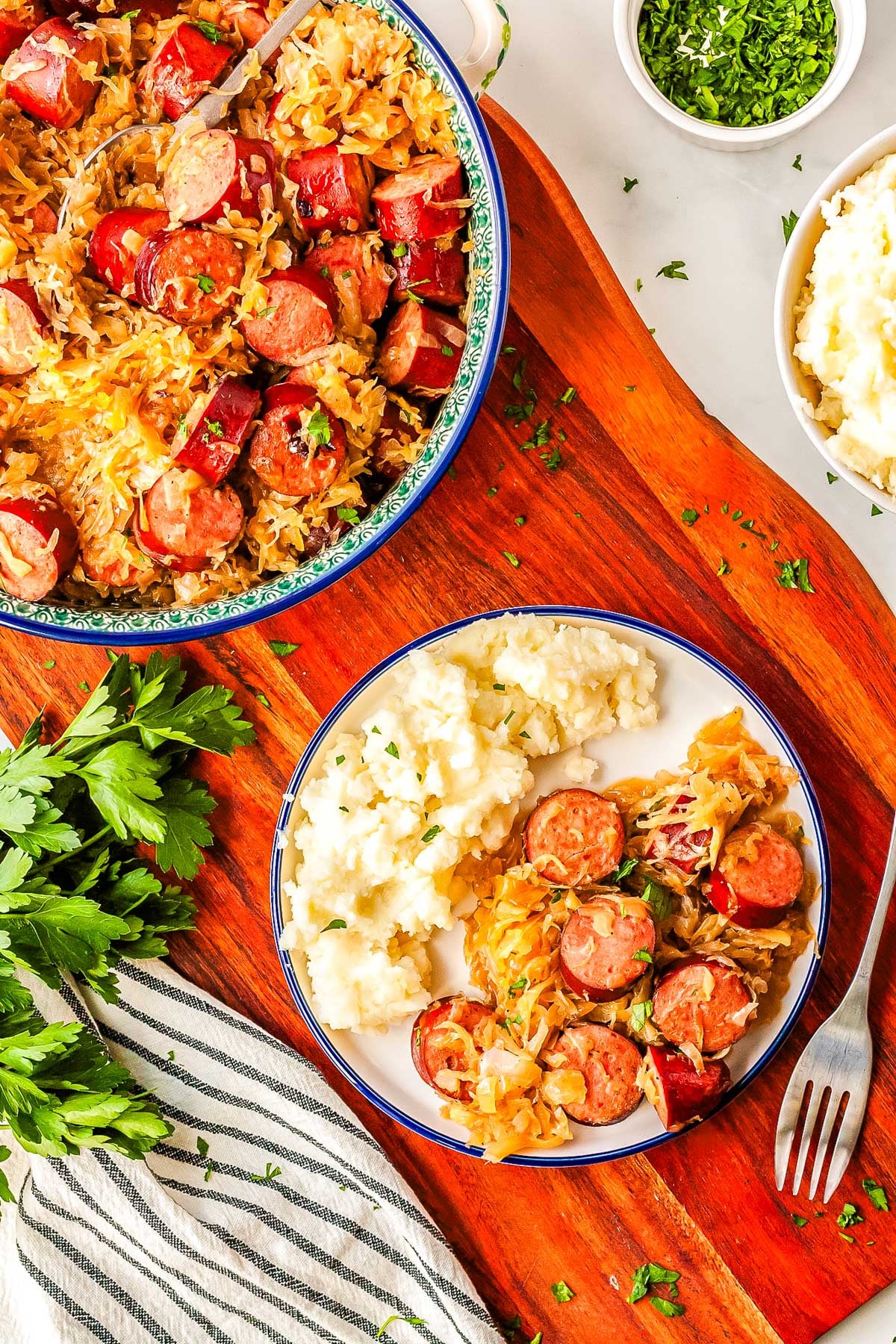 Polish Kapusta on a plate and in a serving dish.