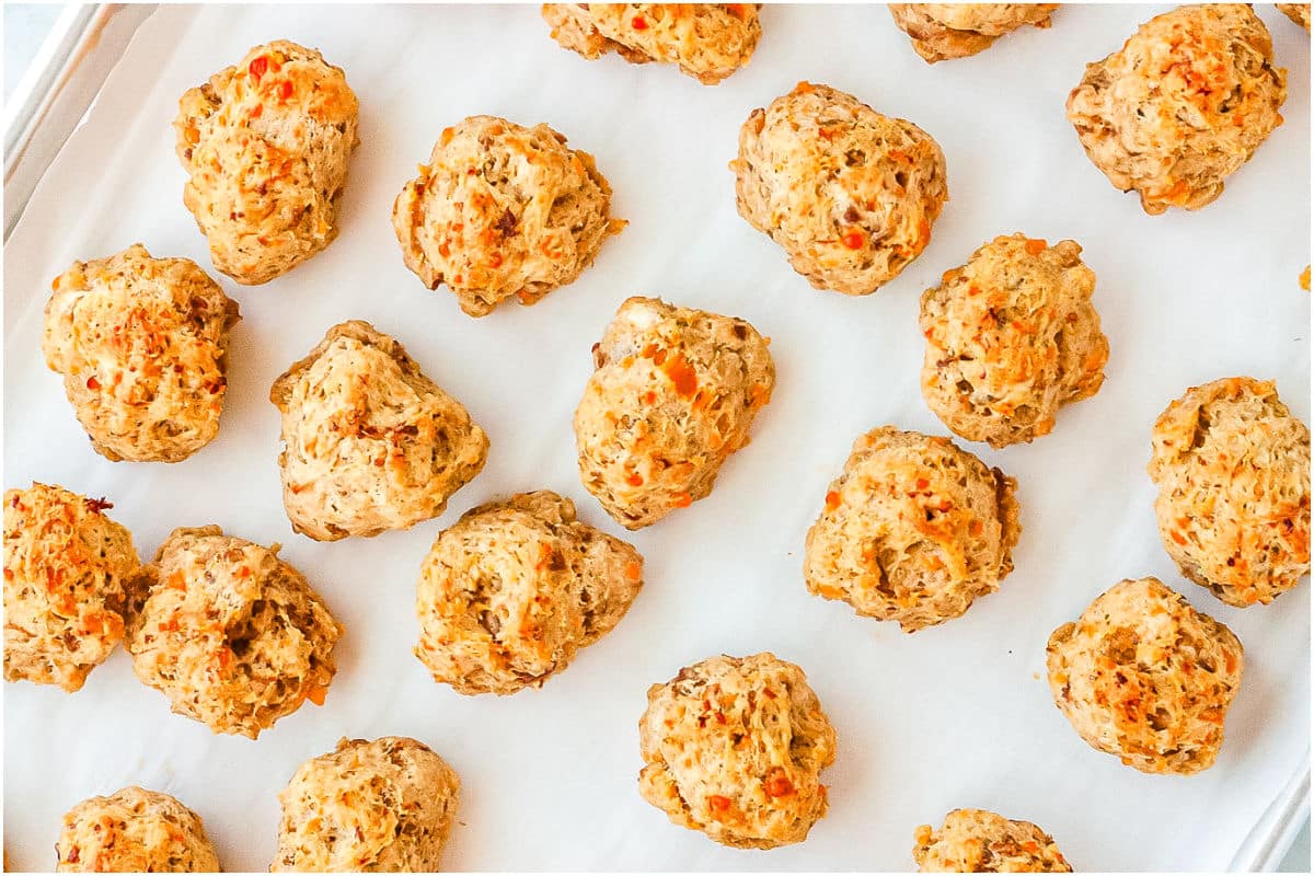 The baked sausage balls on a baking sheet.