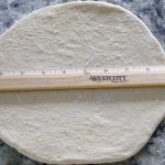 Roll the dough into a 9-inch circle.