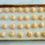 Scoop the sausage mixture into balls and arrange them on the trays.