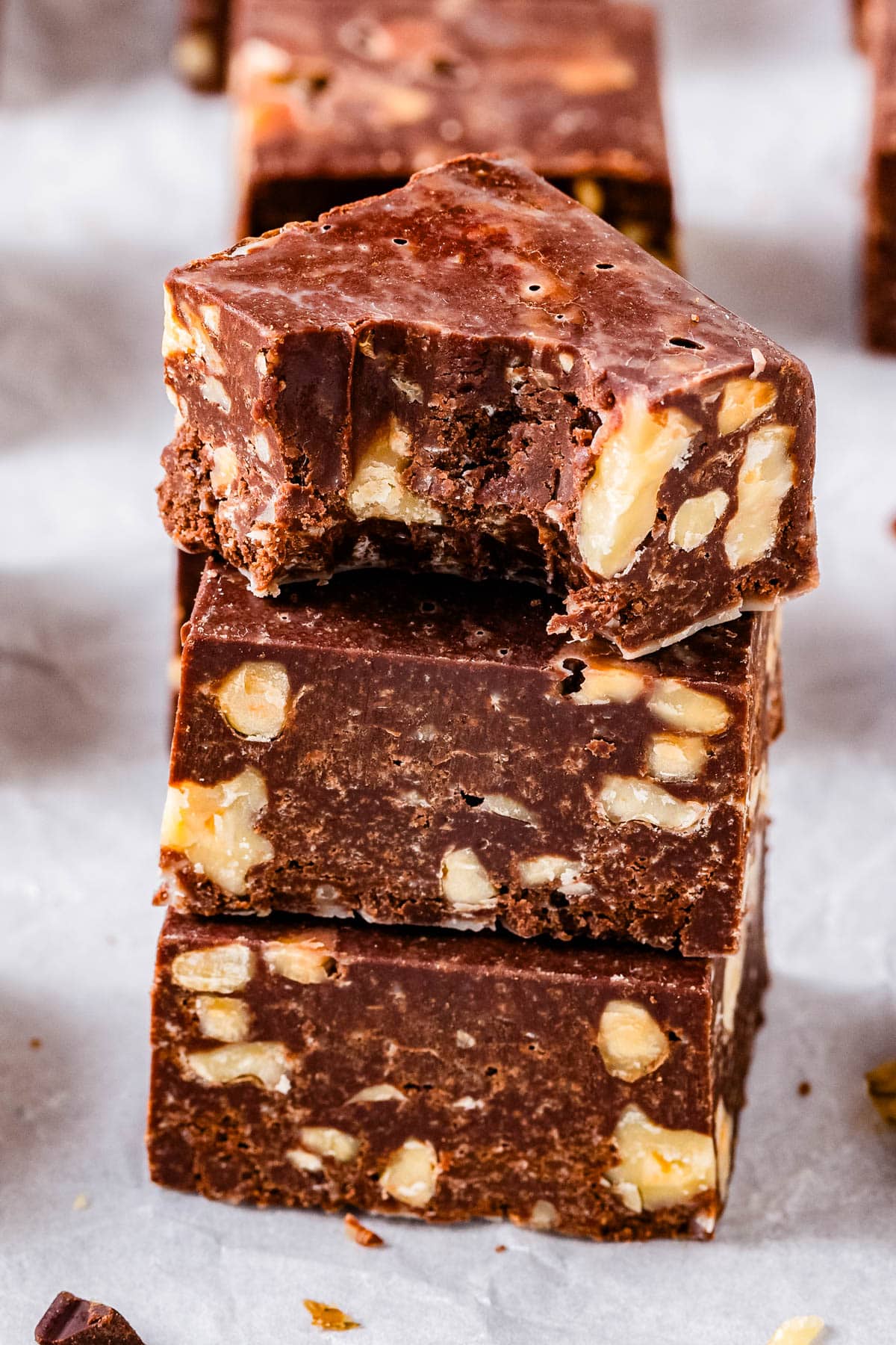 A stack of old fashioned fudge recipe with condensed milk stacked three high.