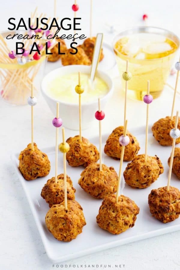 Sausage balls on toothpick with text overlay for Pinterest. 