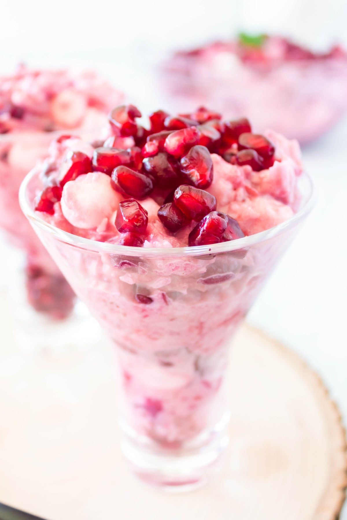 Cranberry fluff salad in a serving glass.