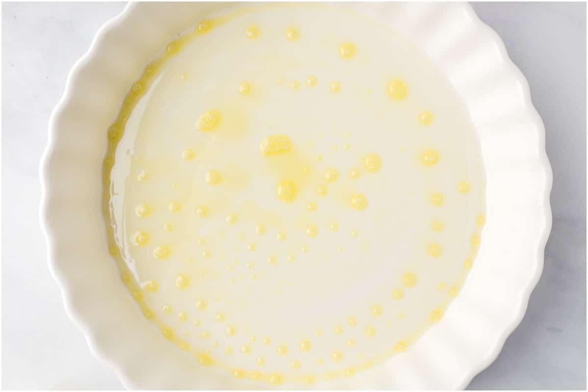 A pie plate sprayed with cooking spray.