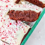 A Peppermint Bark Brownie turned on its side so you can see the fudgy interior.