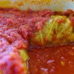 Cover the cabbage rolls with the remaining sauce and bake for 50-60 minutes.