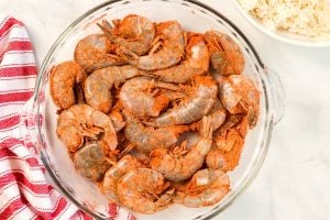 Toss the shrimp with the paprika and flour mixture.