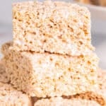 A close up of a stack of rice krispie treats with marshmallow creme.