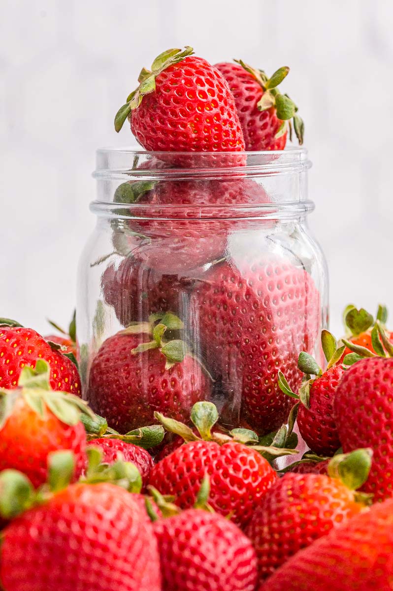 Strawberries in a Mason jar.