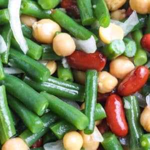 A close up of three bean salad so you can see all of the textures of the salad.